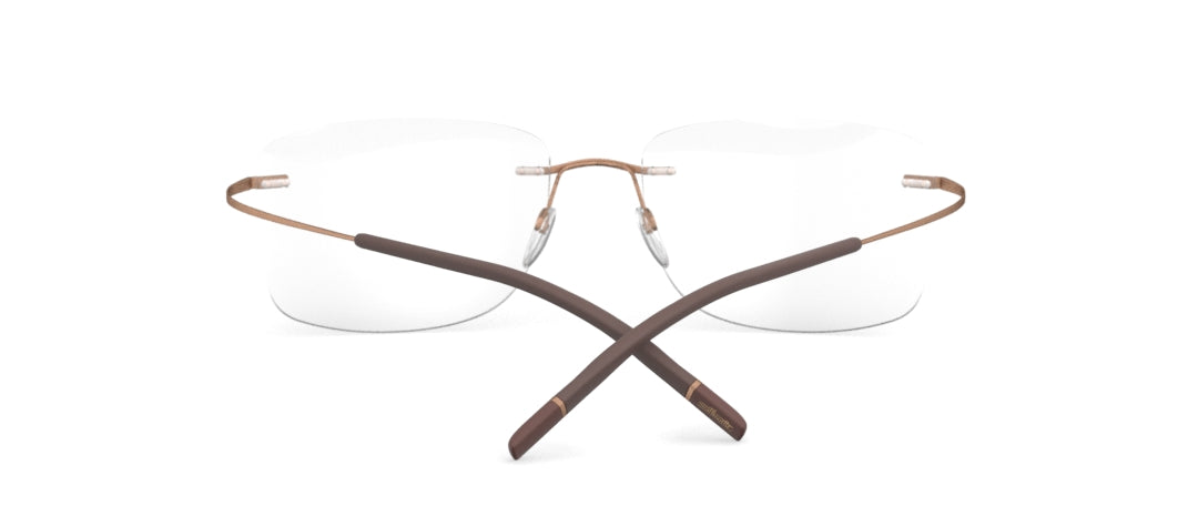 Rear view of rimless eyeglasses with brown metal frame and temple arms extended